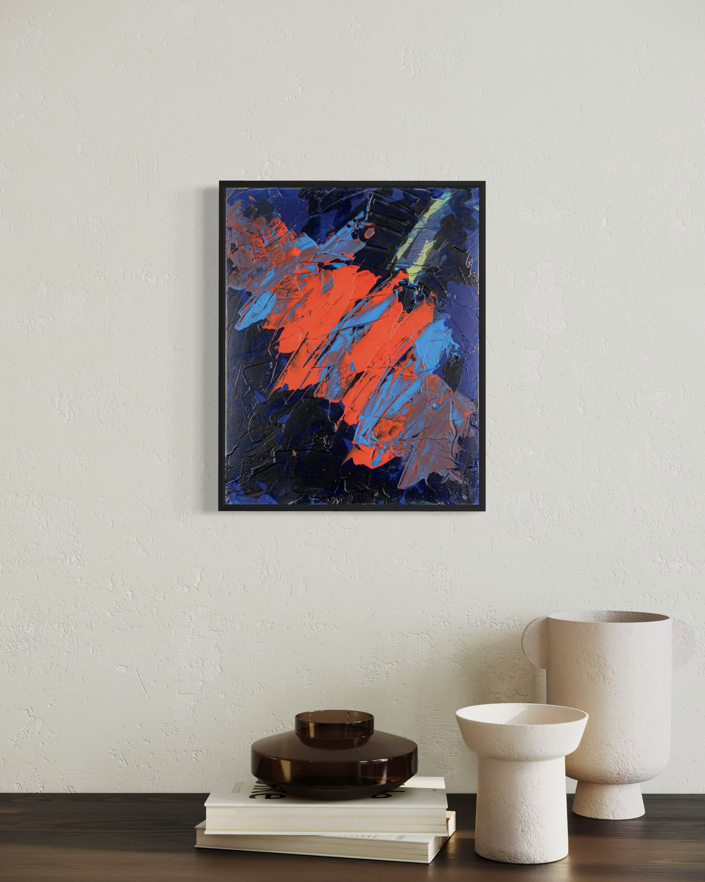 Cosmic Kiss - original painting by Youssef Lakhrif shown in room setting 1. Navy blue cosmic field with a red and orange flame stroke.