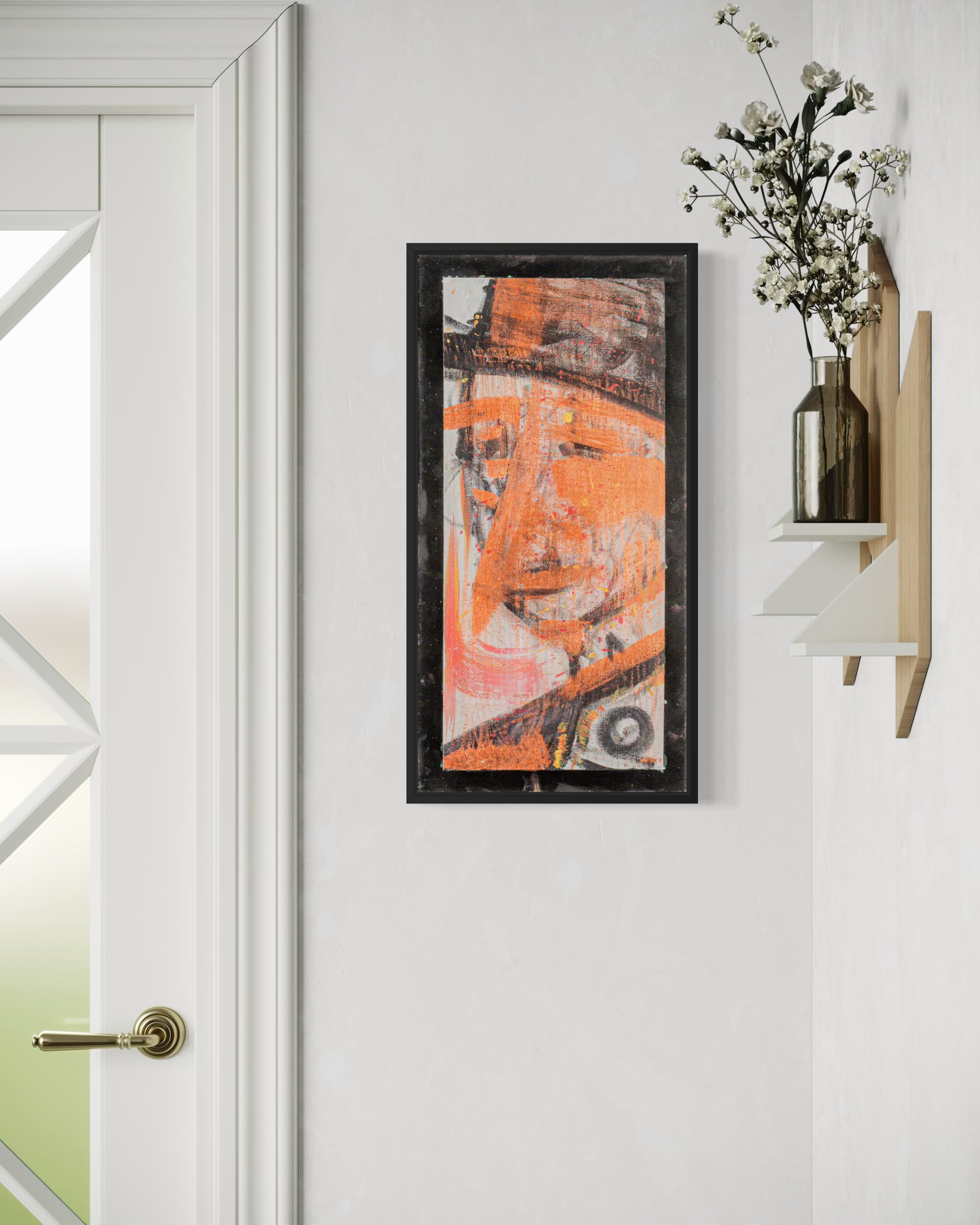 Pinoccio - original painting by Youssef Lakhrif shown in room setting 3. Abstract orange and black figurative face in vertical black frame.
