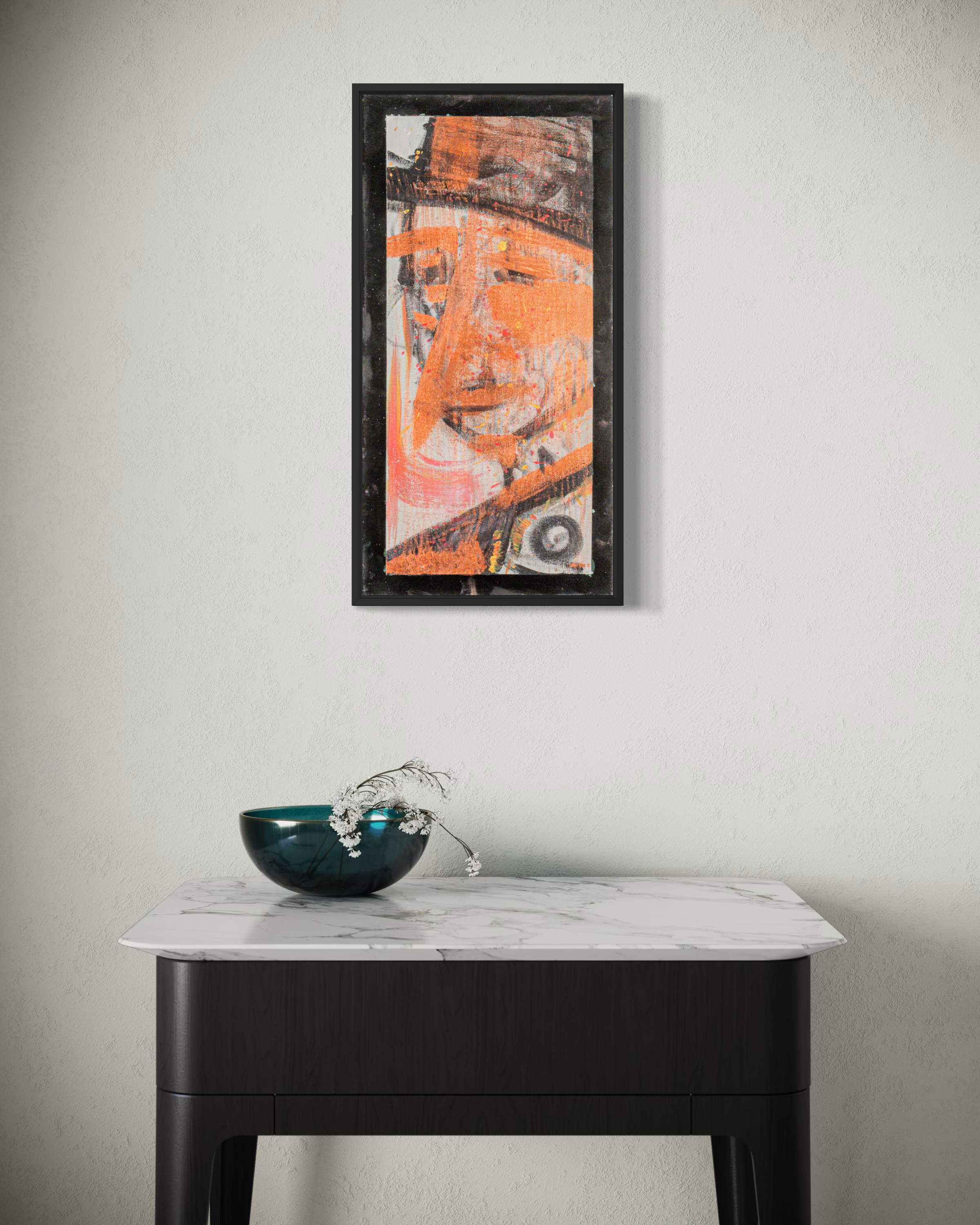 Pinoccio - original painting by Youssef Lakhrif shown in room setting 4. Abstract orange and black figurative face in vertical black frame.